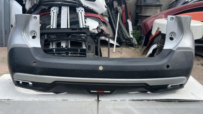 PARACHOQUE TRASERO NISSAN KICKS (17-20)