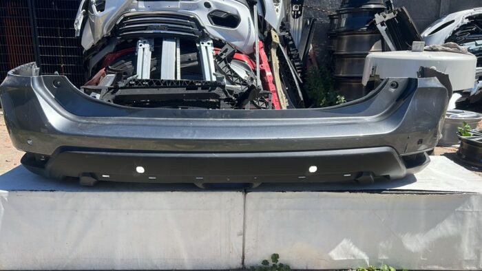 PARACHOQUE TRASERO NISSAN XTRAIL (18-22)
