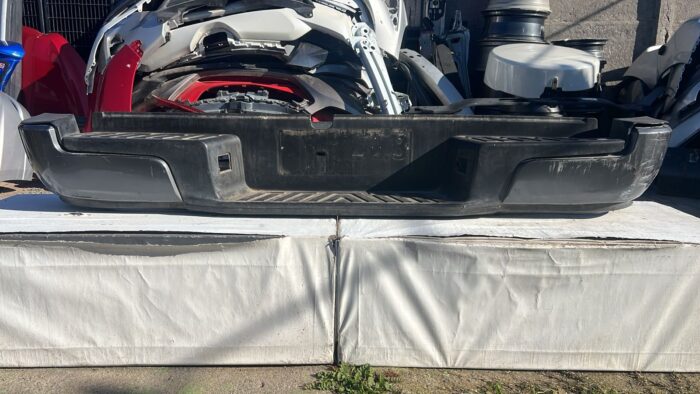 PARACHOQUE TRASERO NISSAN NAVARA (21-24)
